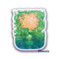 Contour sticker art mockup featuring colorful gaia design. Gaia, a green goddess divine feminine, rests her eyes in meditation as she focuses on the sunny portal above her head. Her green hair surrounds it, like vines full of flowers.